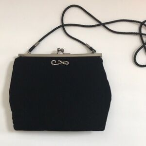 Vintage velvet bag with rhinestone detailing.